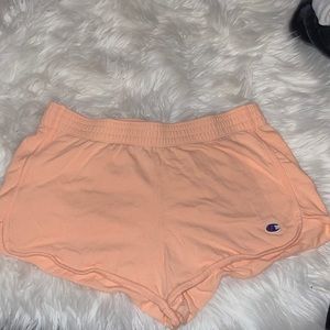 Light orange champion cloth shorts from urban outfitters